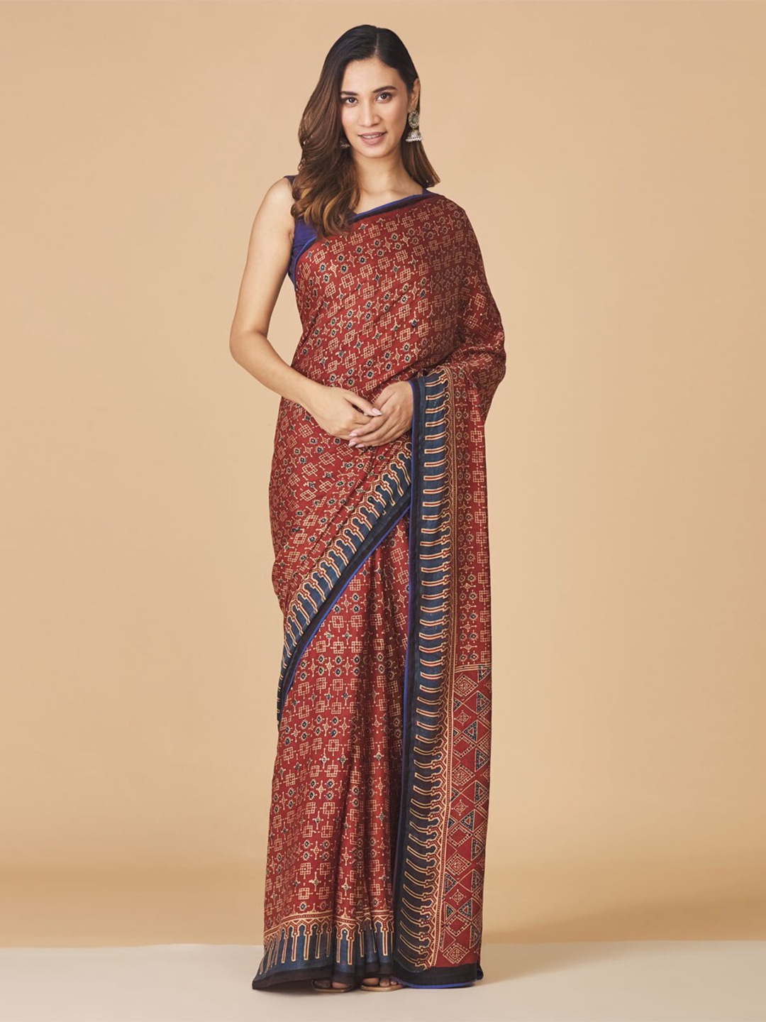 

Fabindia Maroon & Blue Ethnic Motifs Ready to Wear Saree