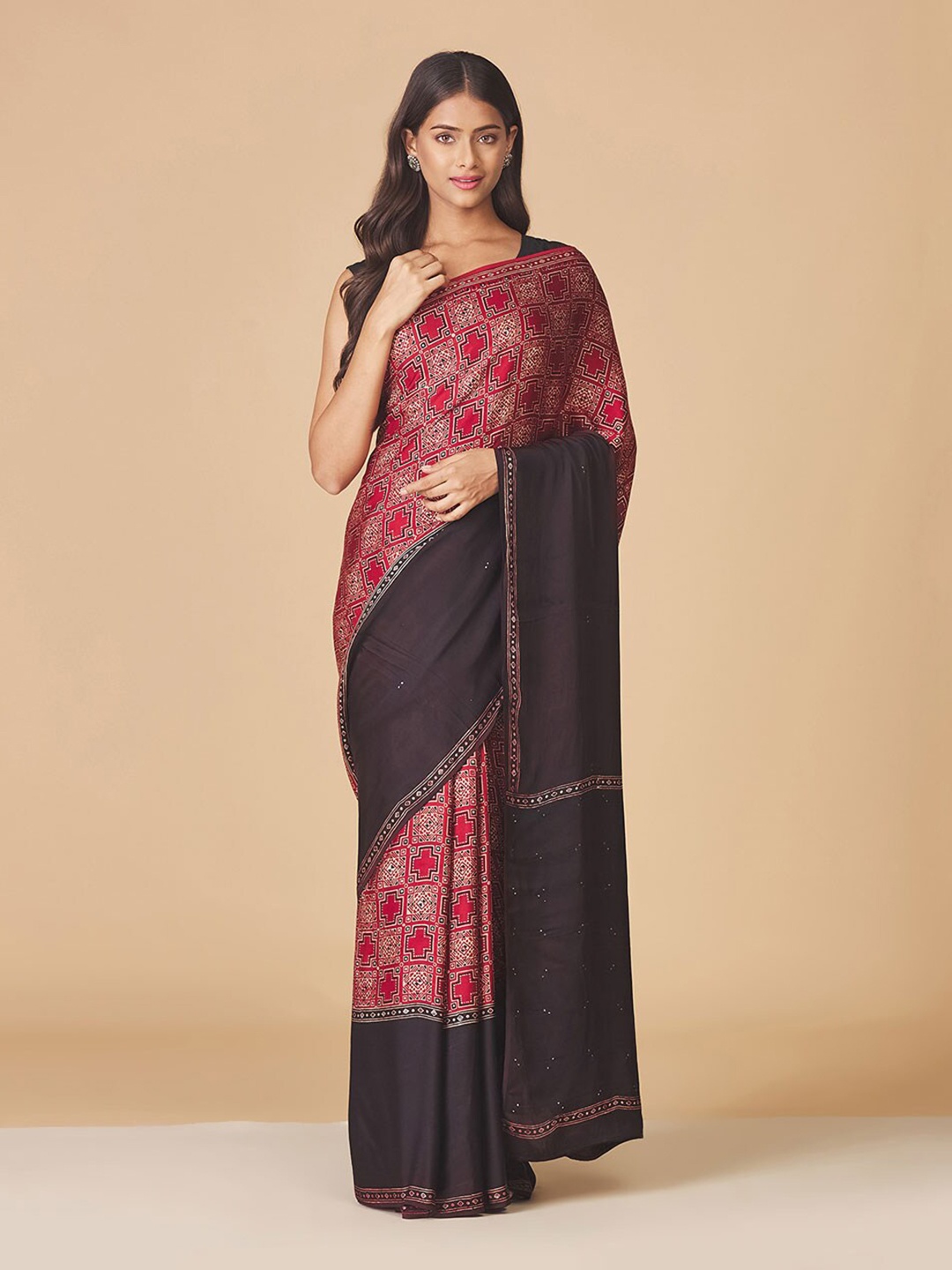 

Fabindia Maroon & Black Ethnic Motifs Saree