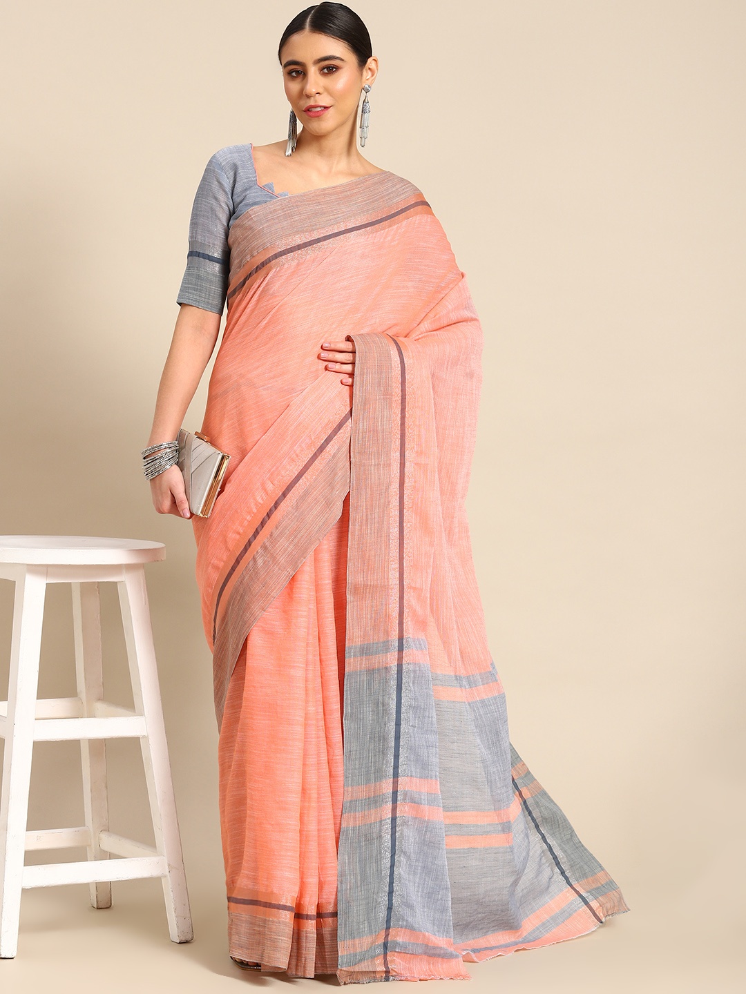 

Mitera Peach-Coloured Linen Cotton Saree