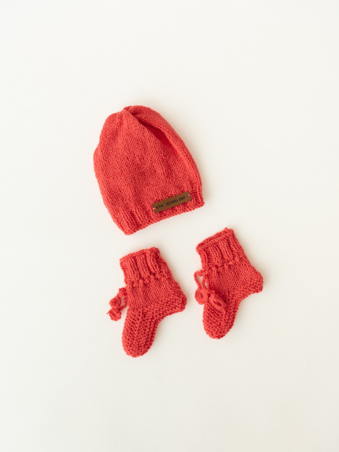 

The Original Knit Kids Red Self Design Acrylic Beanie Cap With Socks