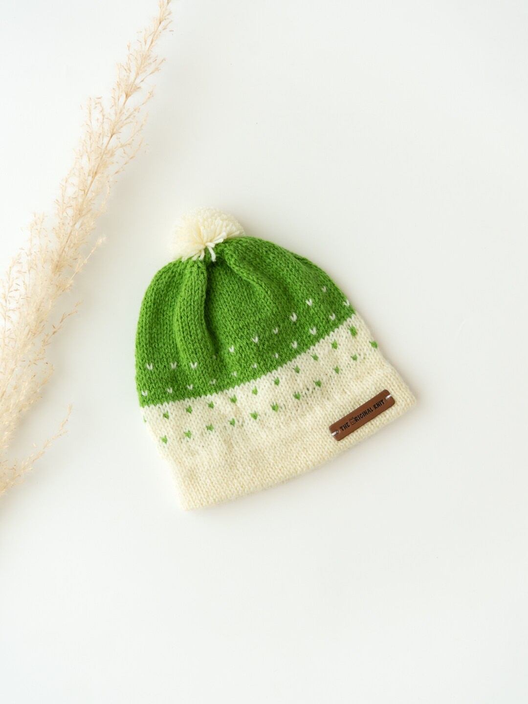 

The Original Knit Kids Green & Off White Self Design Colourblocked Acrylic Beanie Cap