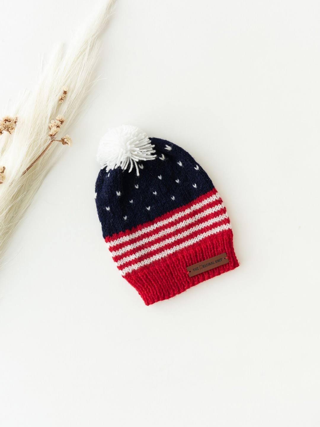

The Original Knit Kids Red & Black Self Design Acrylic Beanie Cap