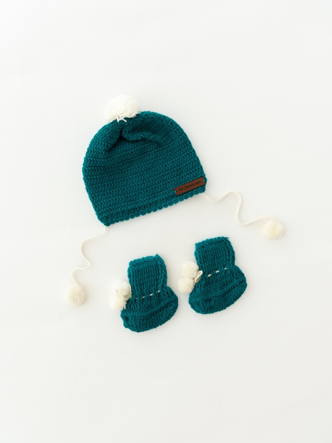 

The Original Knit Kids Green & Cream-Coloured Self Design Acrylic Beanie Cap With Booties