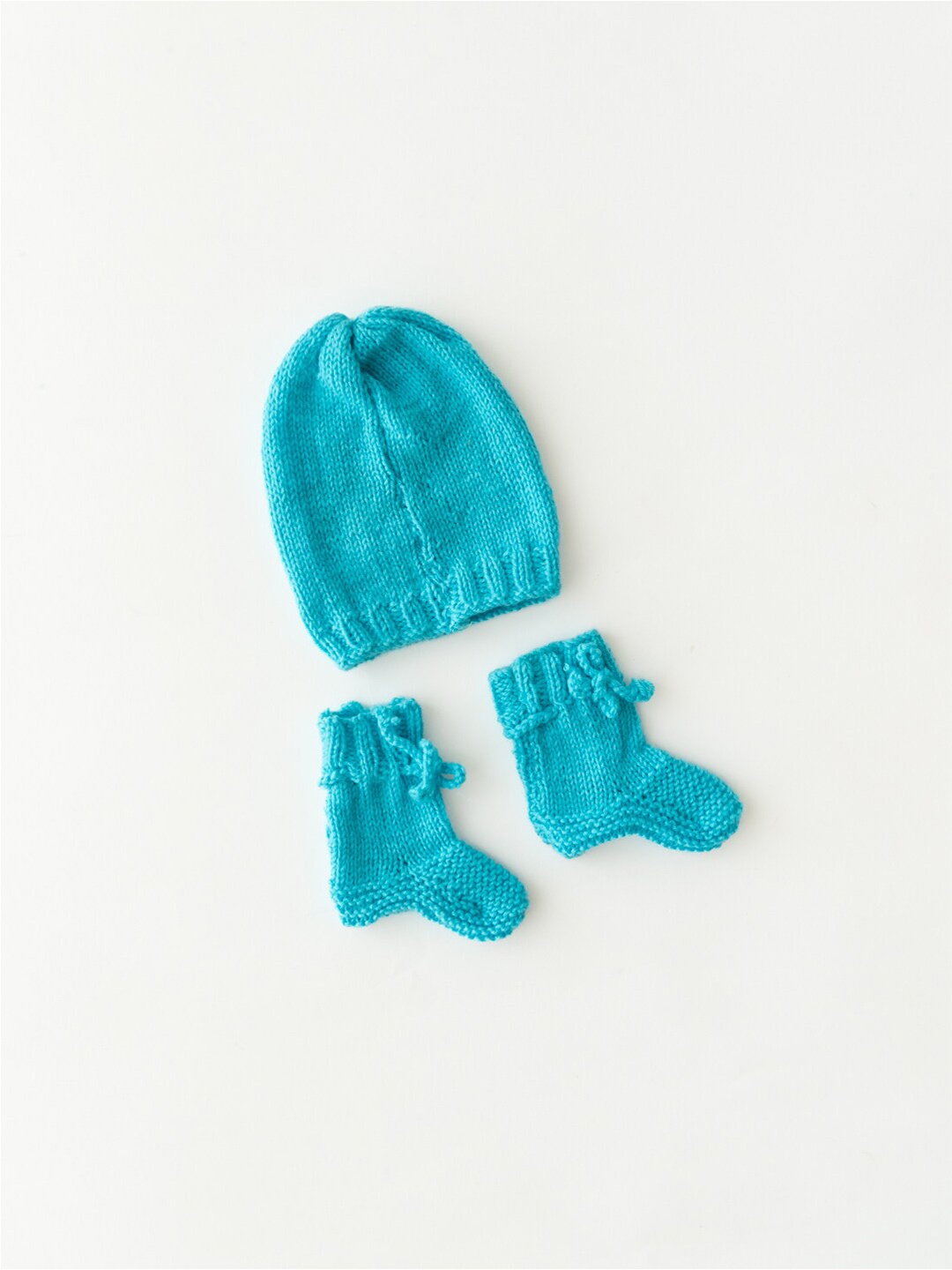 

The Original Knit Kids Blue Self Design Acrylic Beanie Cap With Socks