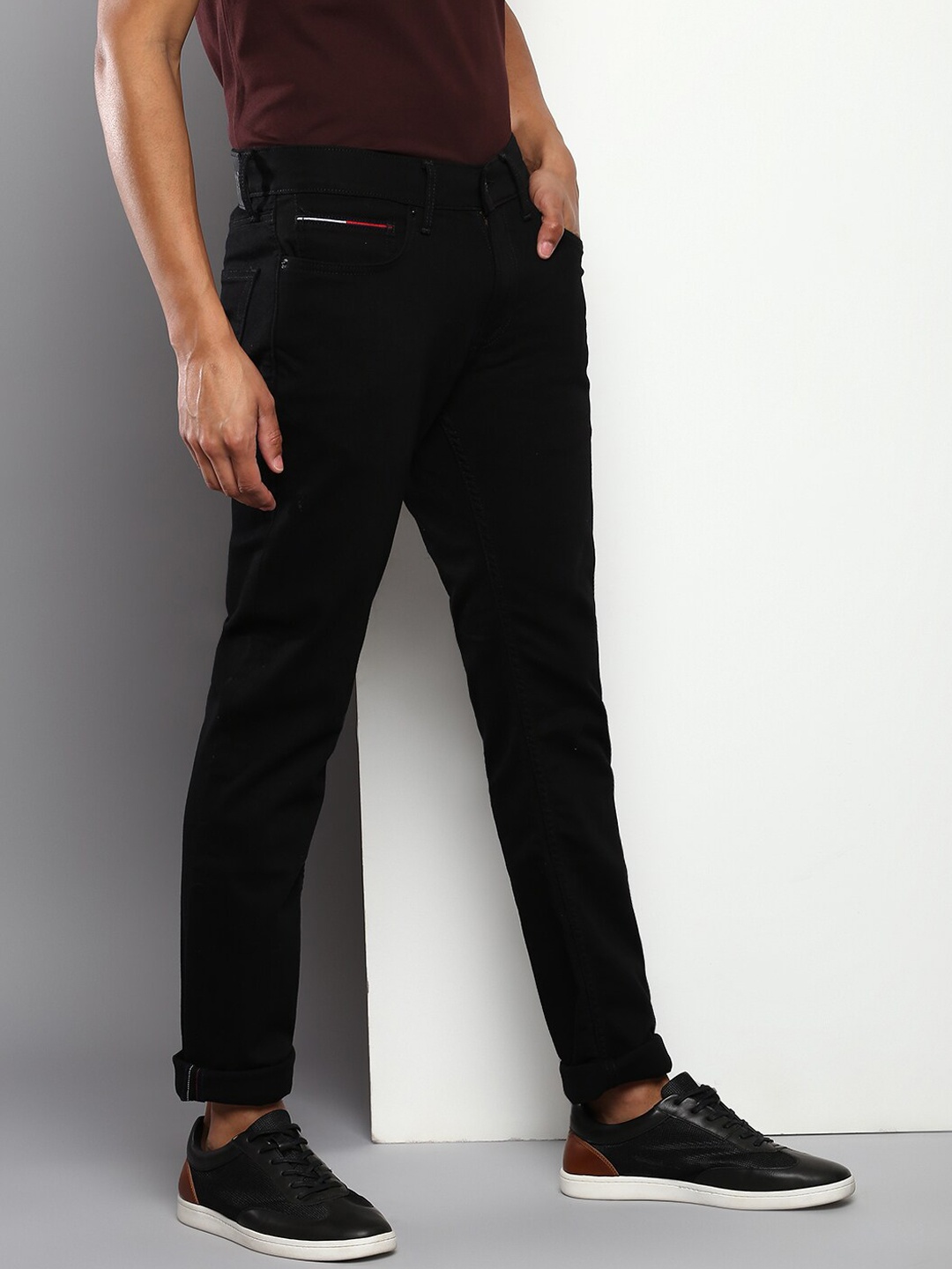 

Tommy Hilfiger Men Black Mid-Rise Slim Fit Cotton Jeans