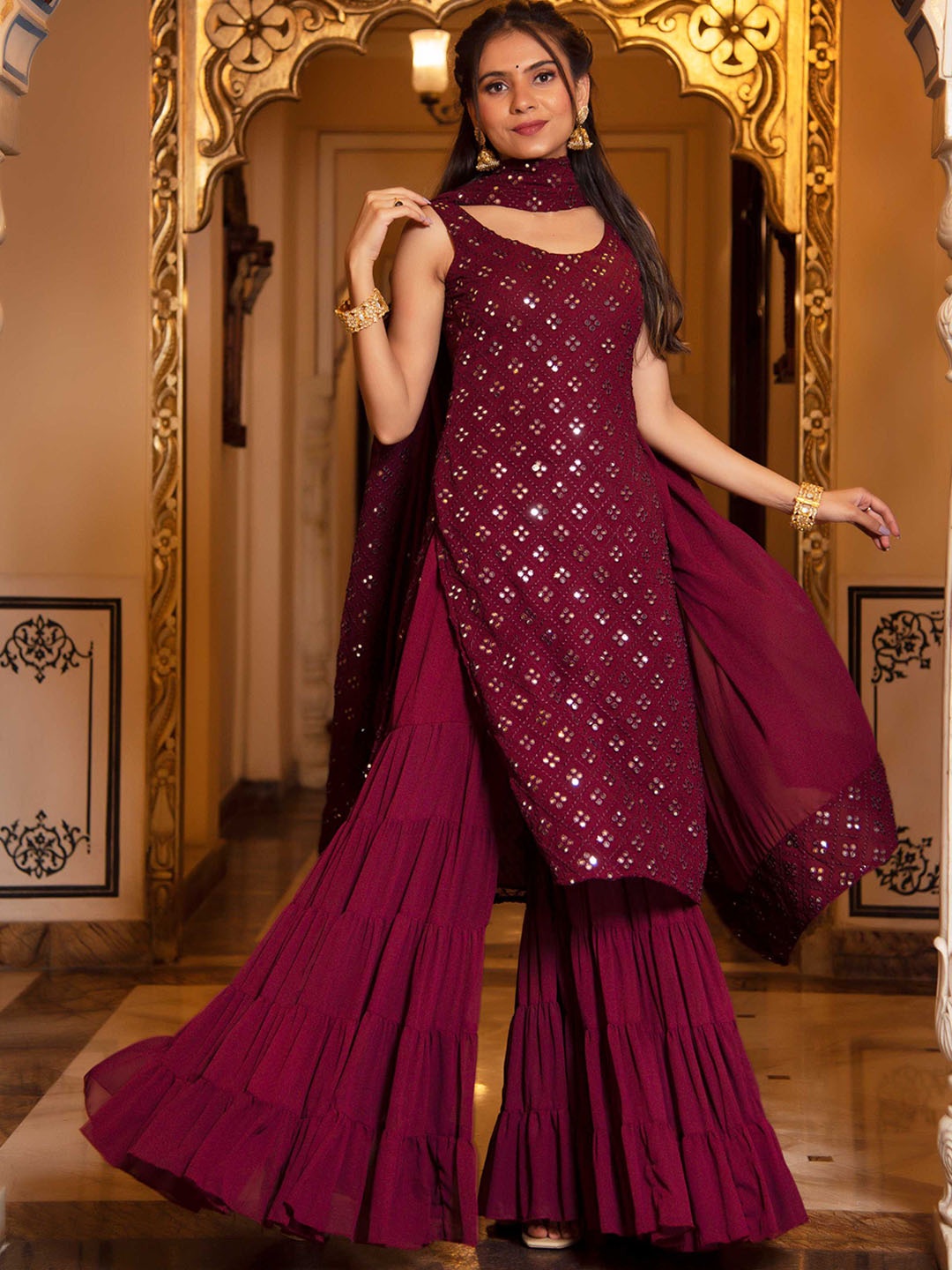 

Calmna Women Burgundy Embroidered Straight Kurta with Sharara & With Dupatta