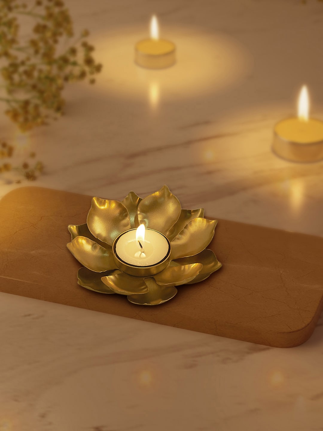 

Living scapes by Pantaloons Gold Solid Metal Candle Holder