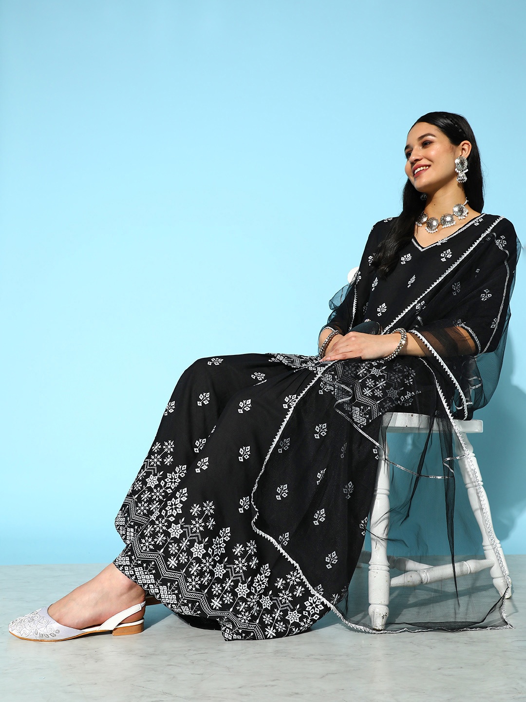 

Stylum Women Black Ethnic Motifs Printed Kurti With Sharara & With Dupatta