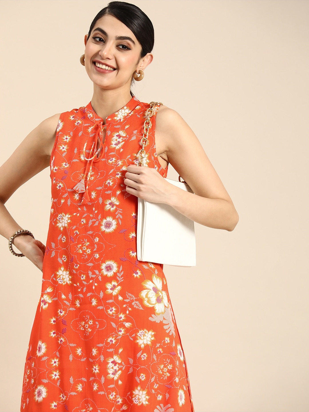 

Anouk Women Floral Printed Keyhole Neck Floral Kurta With Tie Up Details, Orange