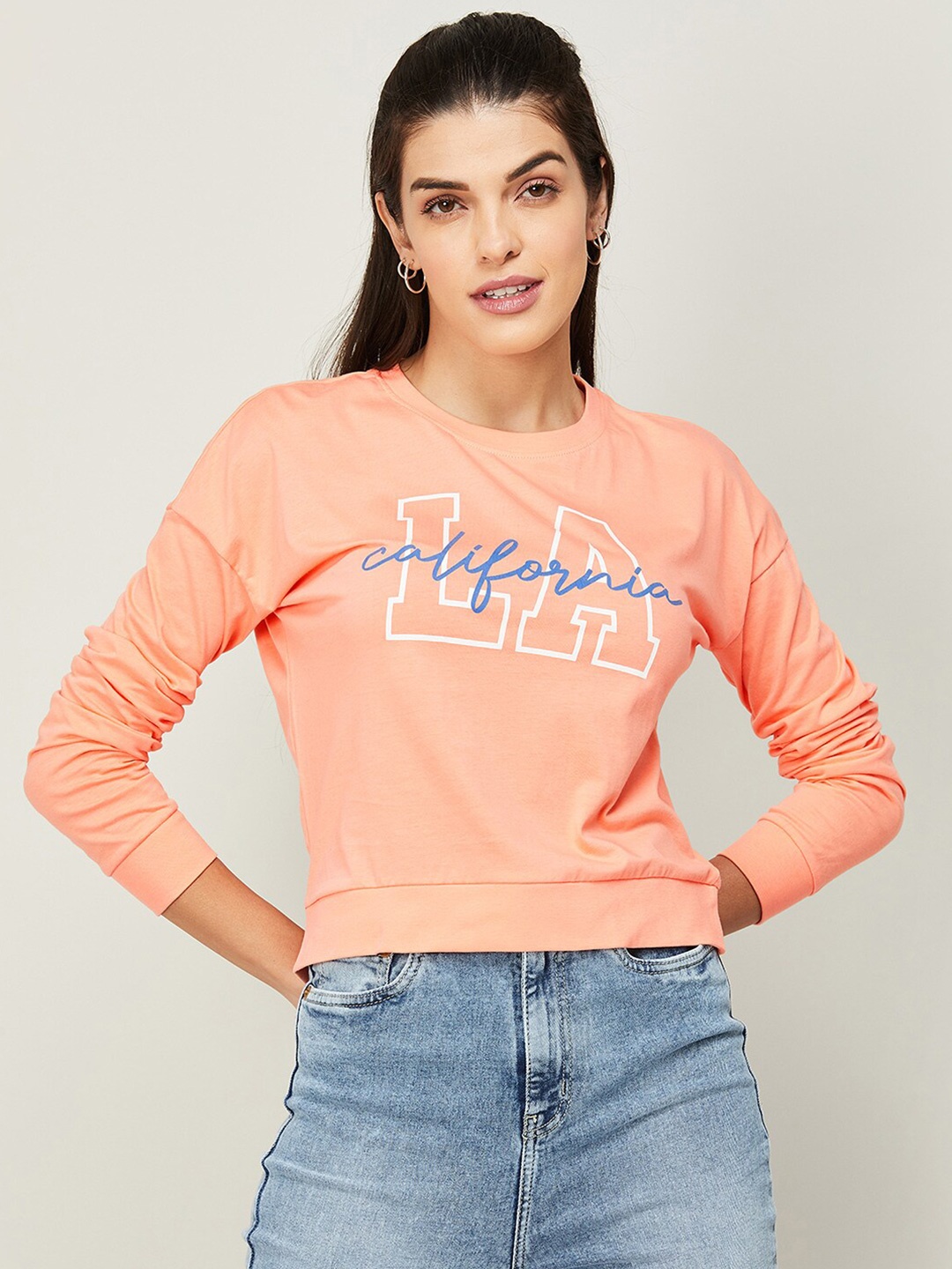 

Ginger by Lifestyle Women Orange Typography Printed Sweatshirt