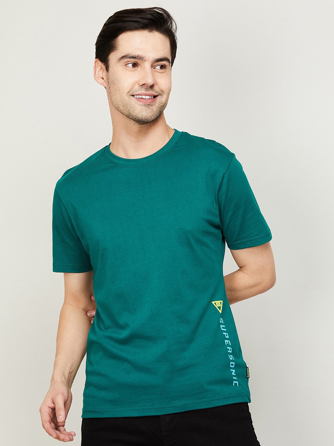 

Bossini Men Green Solid Cotton T-shirt