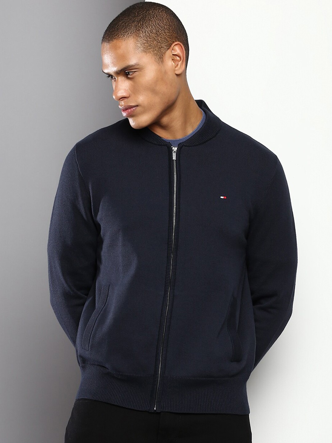 

Tommy Hilfiger Men Navy Blue Solid Round Neck Pure Cotton Sweaters