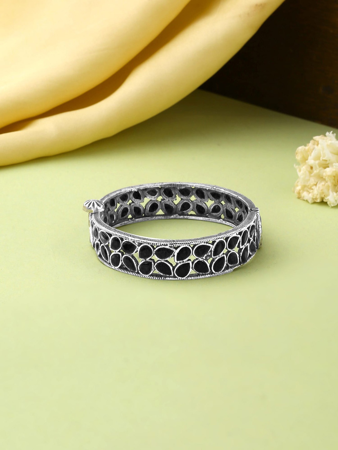 

Yellow Chimes Silver Oxidised Black Stone Studded Bangle Bracelet