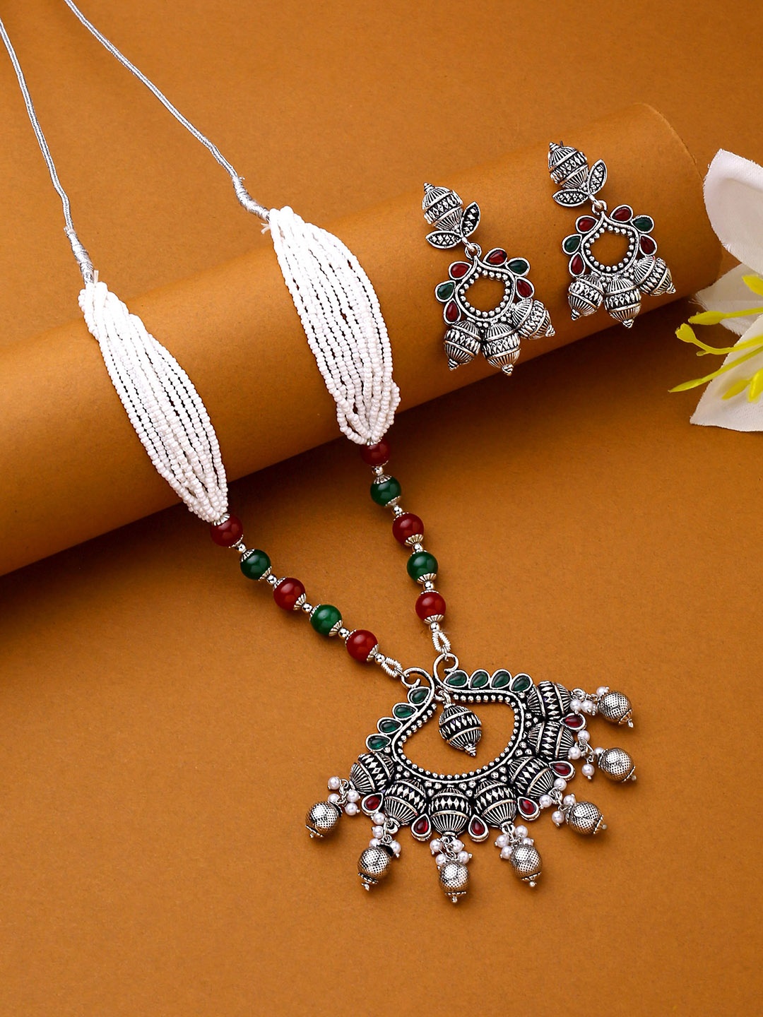 

Yellow Chimes Oxidised Silver-Plated White & Red Stone-Studded & Pearl Beaded Jewellery Set