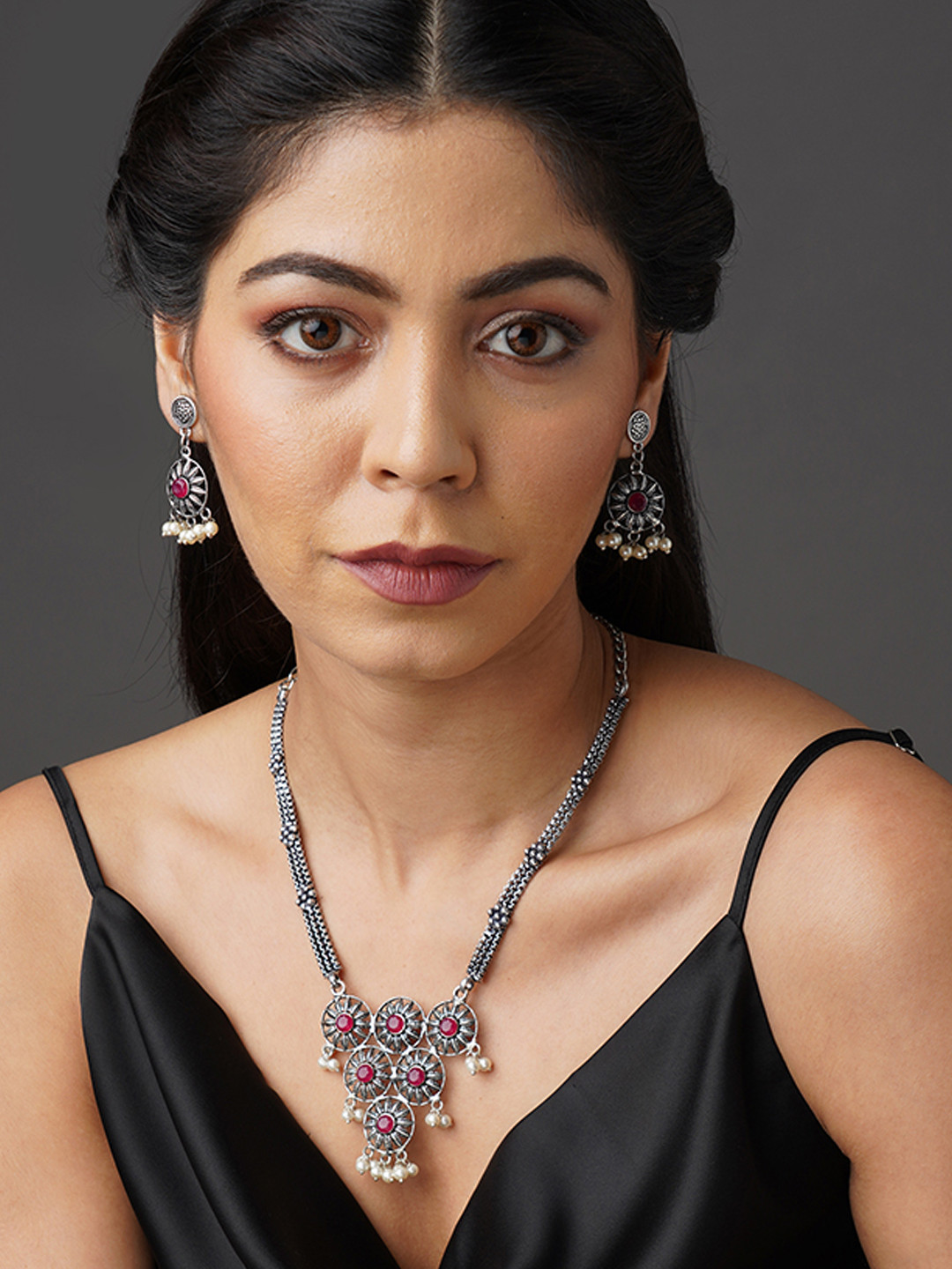 

Binnis Wardrobe Silver Plated & Red Stones-Studded & Beaded Jewellery Set