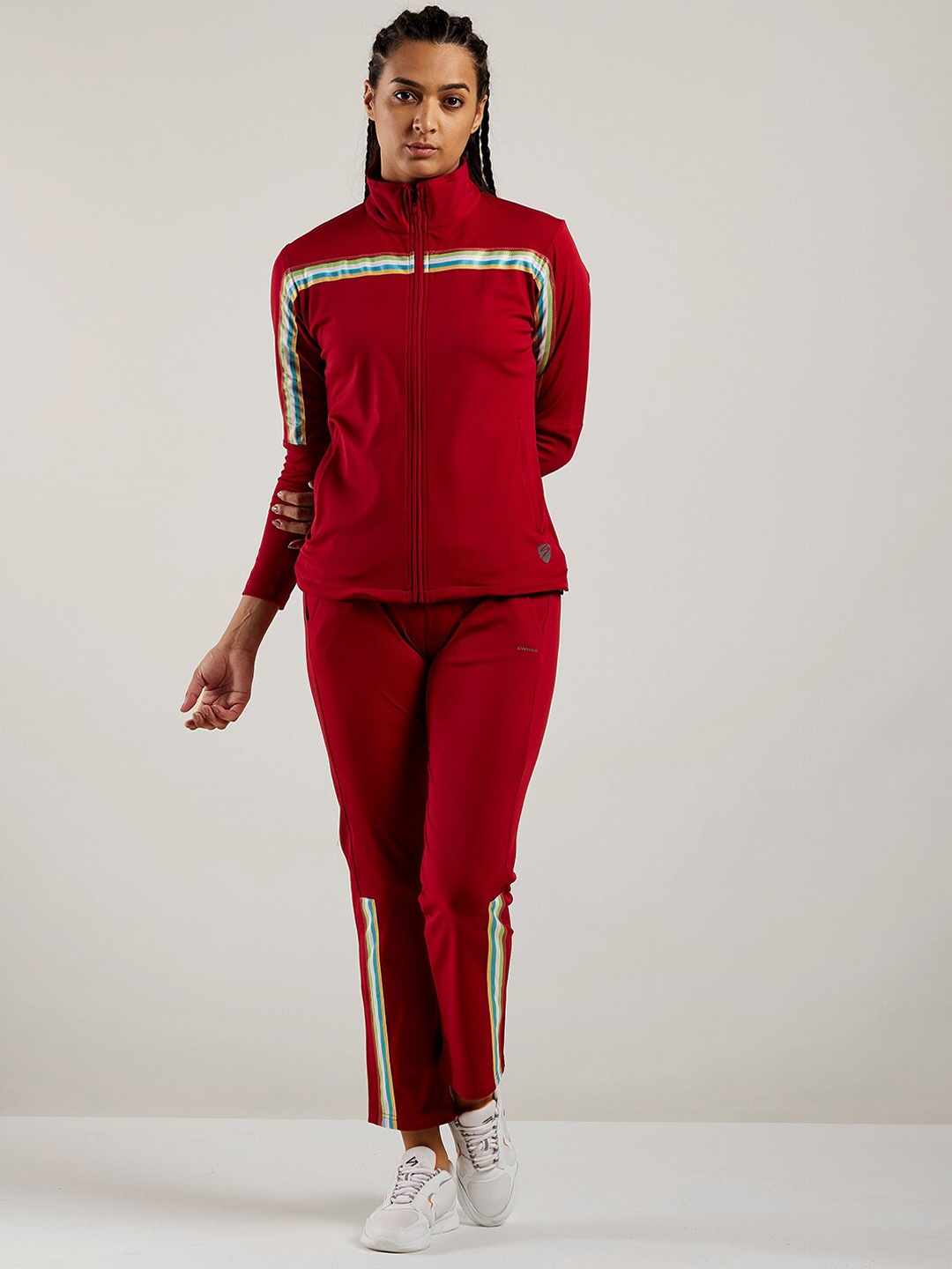 

UNPAR Women Red & Blue Solid Tracksuits