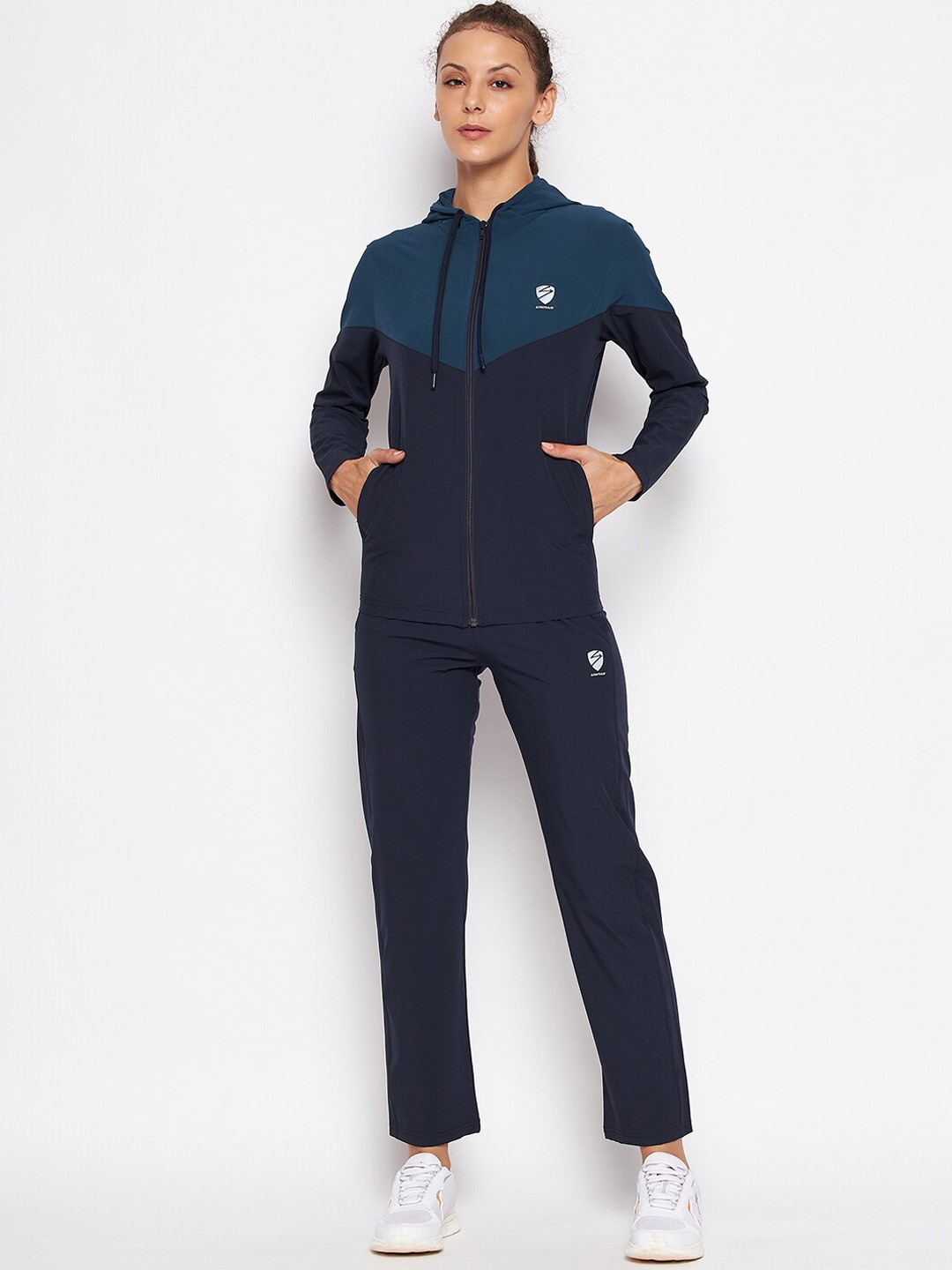 

UNPAR Women Navy Blue & Green Colourblocked Tracksuits