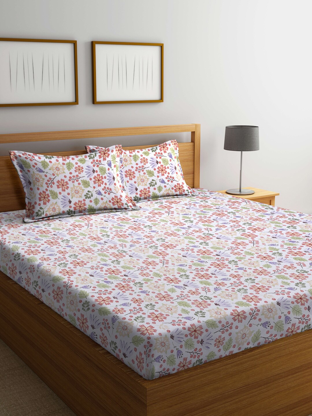 

BOMBAY DYEING White & Orange Floral 120 TC King Bedsheet with 2 Pillow Covers