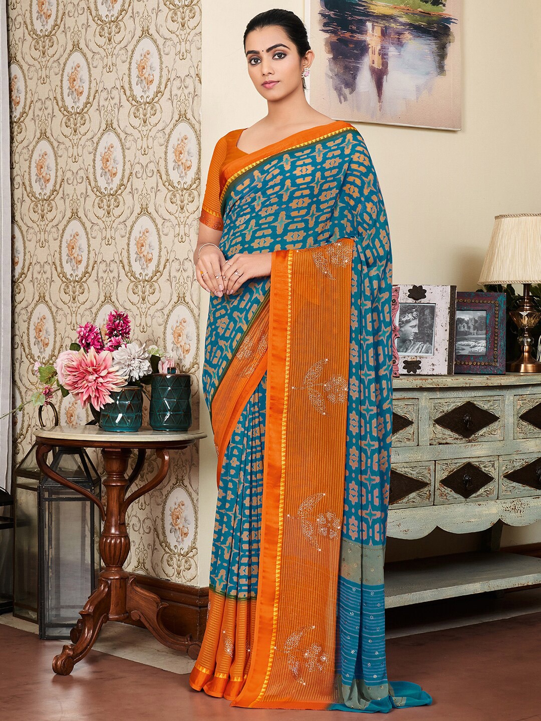 

Saree mall Blue & Orange Silk Blend Bagh Sarees