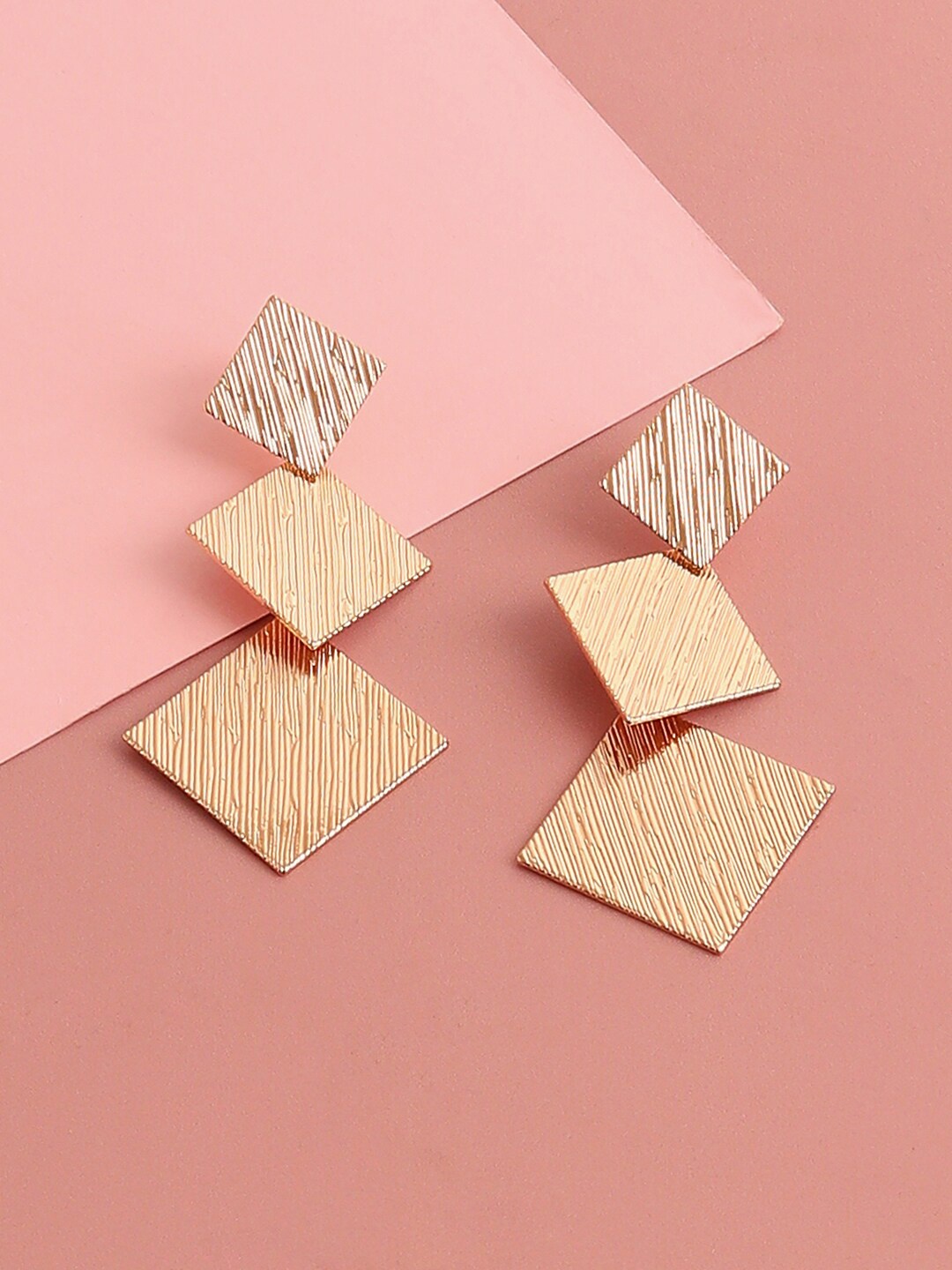 

SOHI Gold Plated Contemporary Drop Earrings