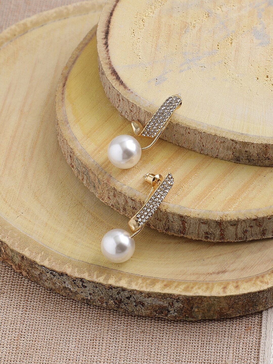 

SOHI Gold-Plated & White Contemporary Drop Earrings