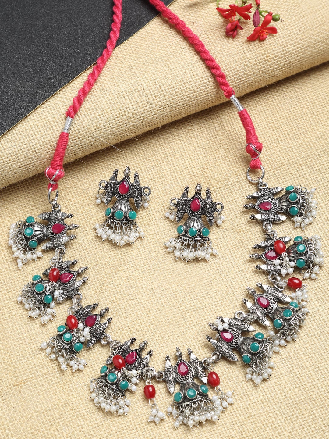 

Dhrohar Silver-Plated Oxidised Pink & Sea Green Artificial Stone Studded & Beaded Antique Jewellery Set