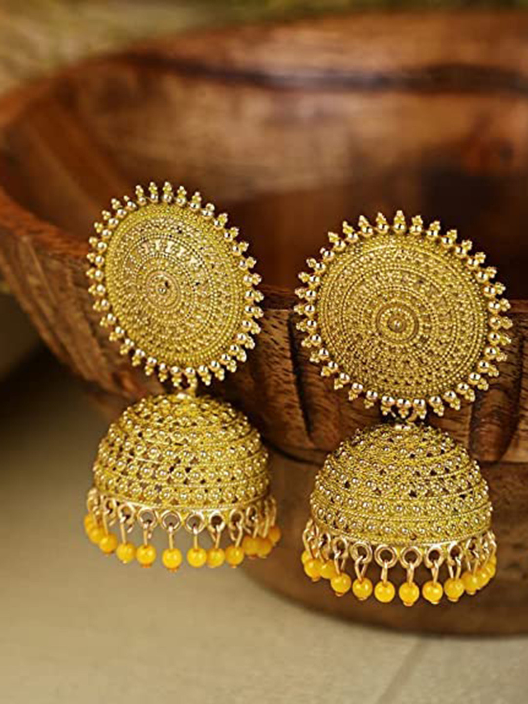 

Krelin Yellow Dome Shaped Jhumkas Earrings
