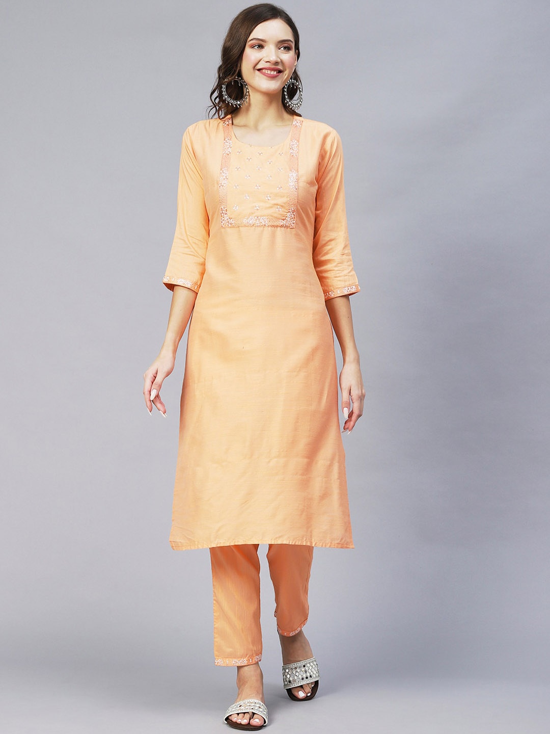 

POONAM DESIGNER Women Orange Embroidered Thread Work Kurta with Trousers