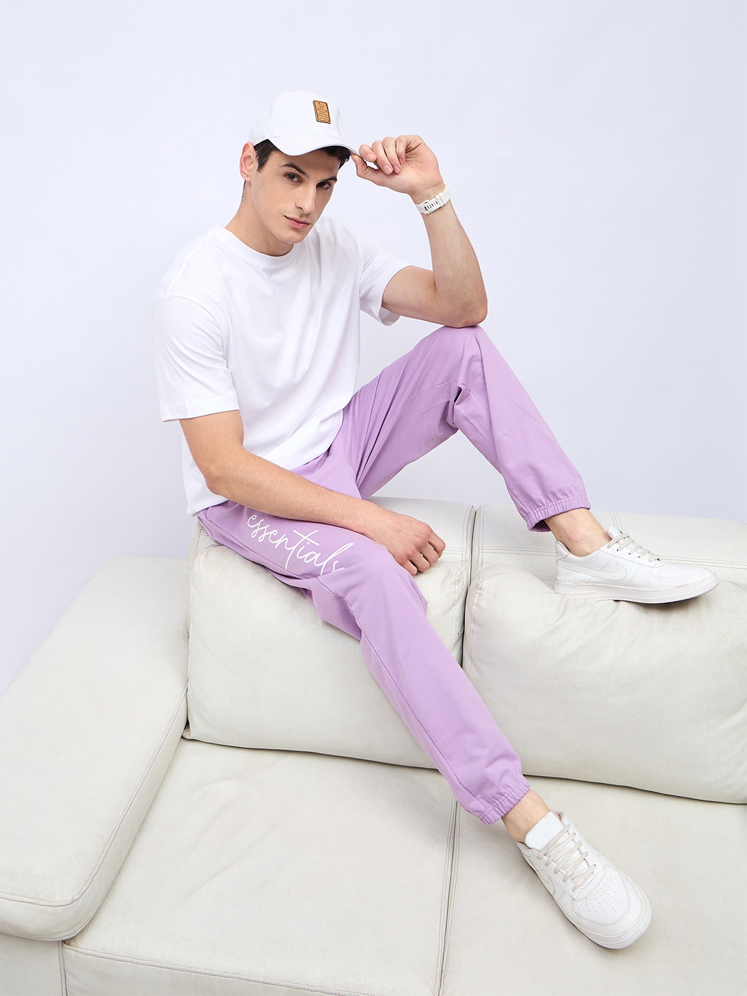 

Styli Men Purple Slogan Print Oversized Fit Joggers with Slip Pocket