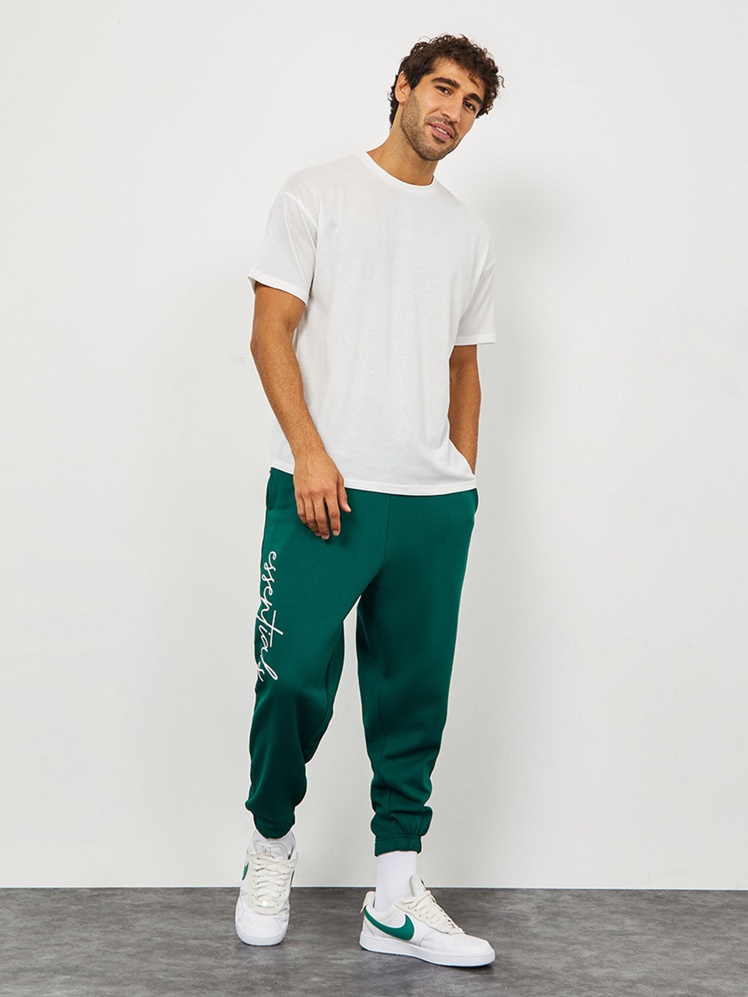 Styli Men Slogan Print Oversized Jogger