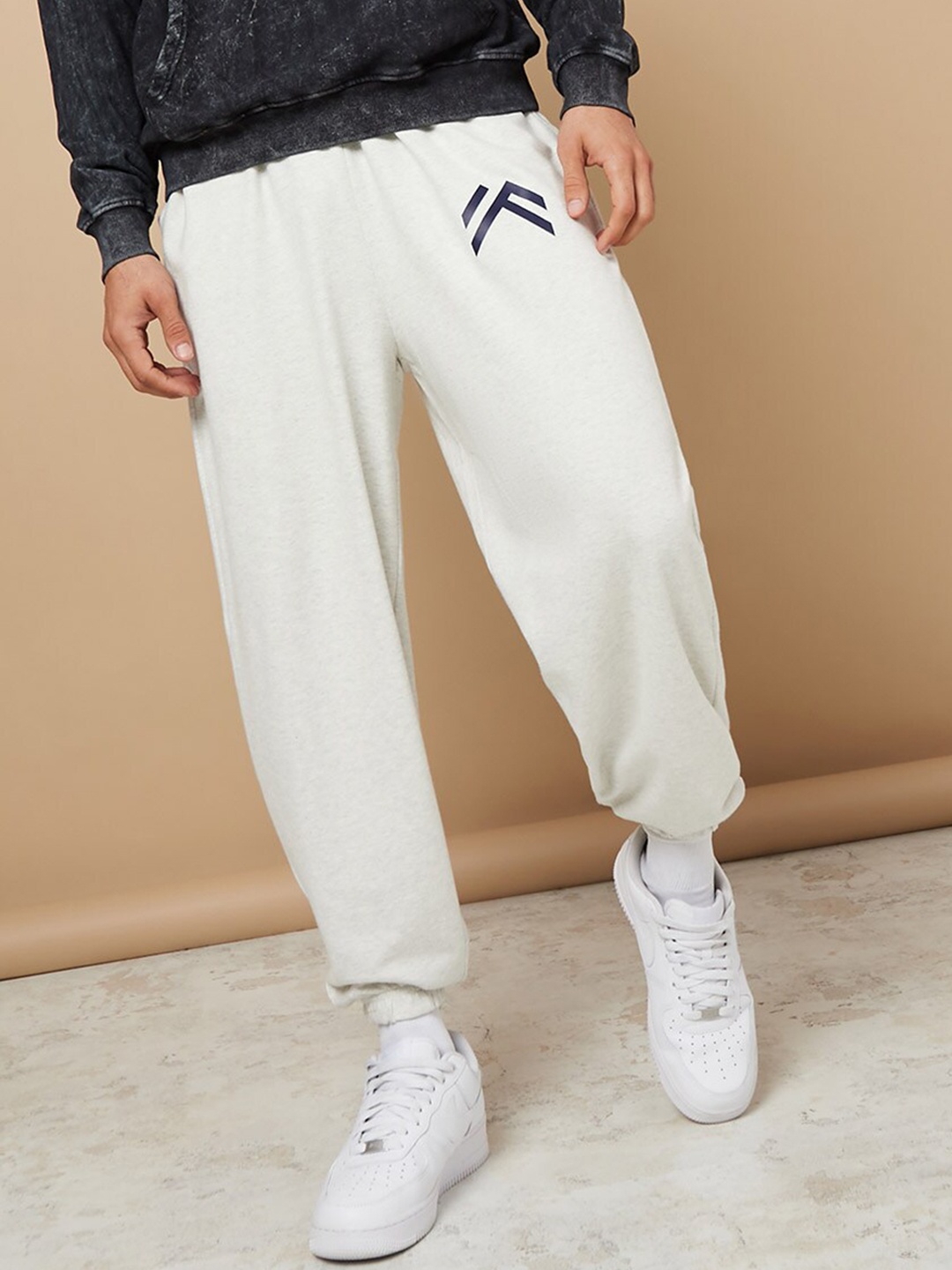 

Styli Men Printed Detail Oversized Joggers, Cream