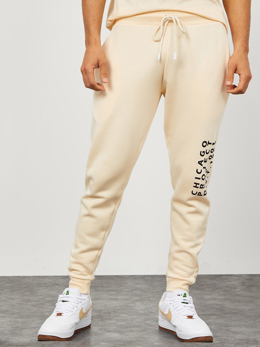 

Styli Text Print Detail Slim Fit Jogger with Pockets, Cream
