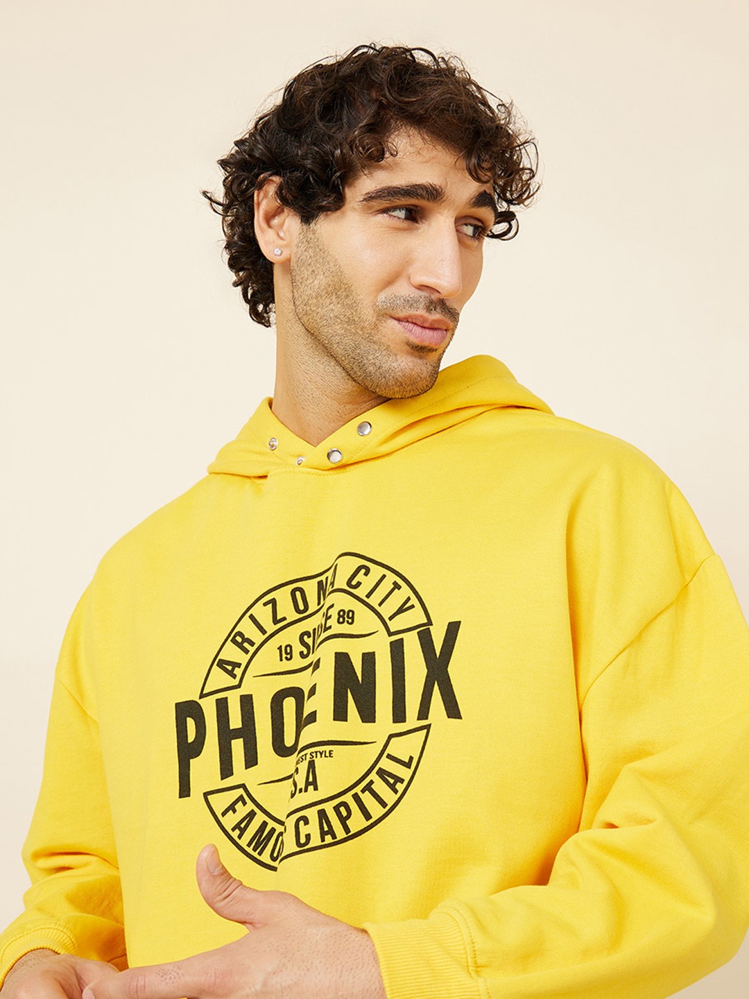 

Styli Graphic Printed Oversized Hooded Sweatshirt, Yellow