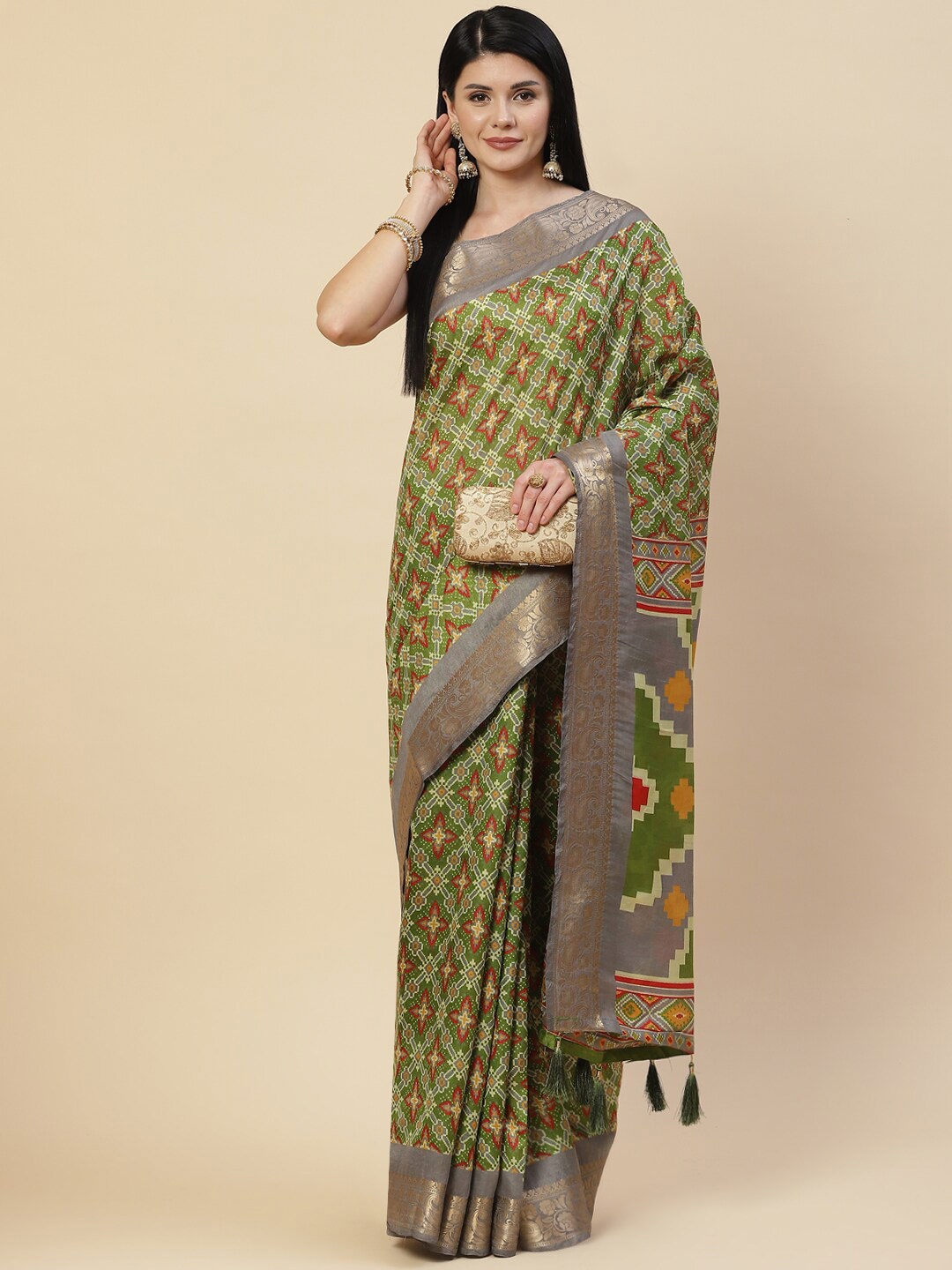 

Meena Bazaar Green & Red Ethnic Motifs Zari Art Silk Saree