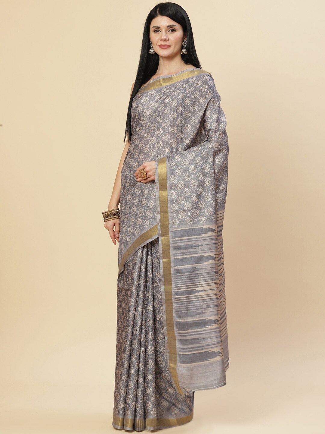 

Meena Bazaar Grey & Gold-Toned Ethnic Motifs Zari Art Silk Tussar Saree