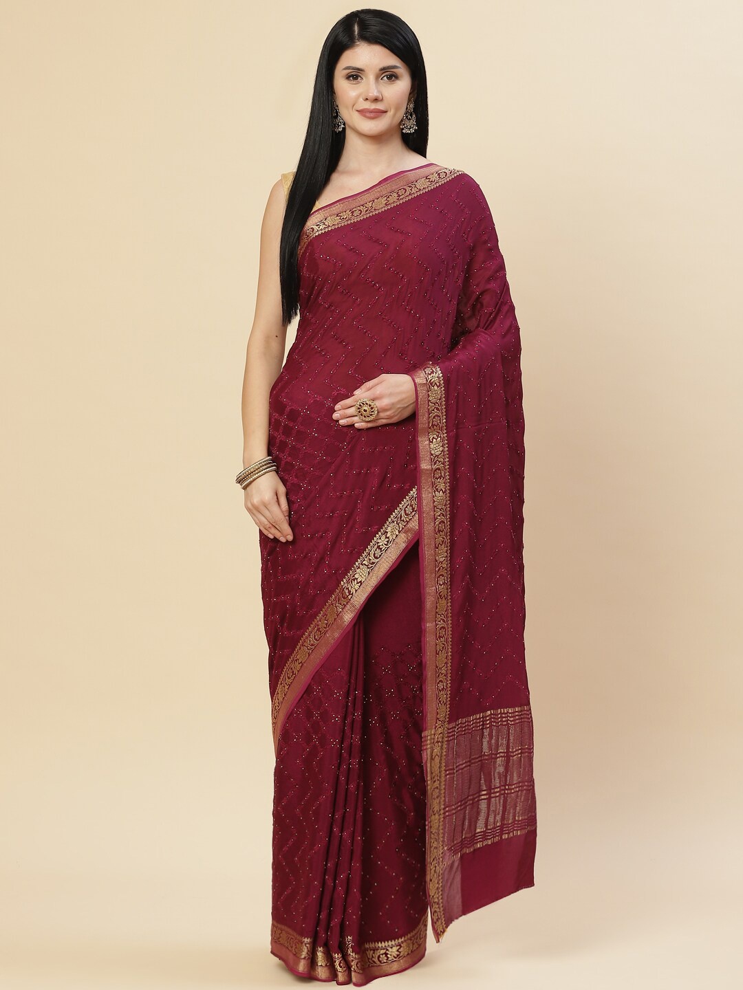 

Meena Bazaar Burgundy & Gold-Toned Embellished Zari Saree
