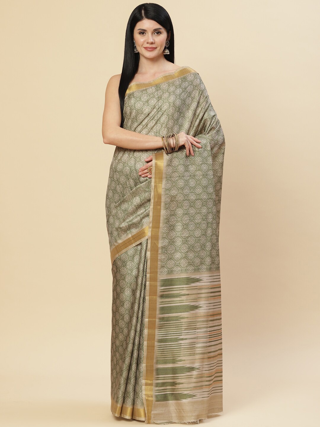 

Meena Bazaar Green & Gold-Toned Ethnic Motifs Zari Art Silk Tussar Saree