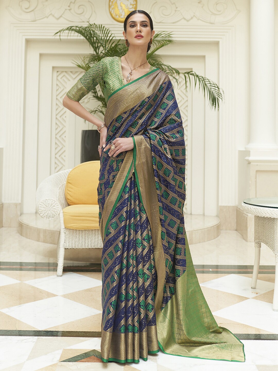 

Mitera Navy Blue & Green Ethnic Motifs Zari Patola Saree