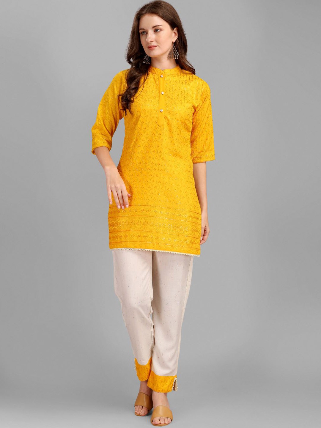 

GUFRINA Women Yellow Floral Embroidered Sequinned Kurti with Trouser