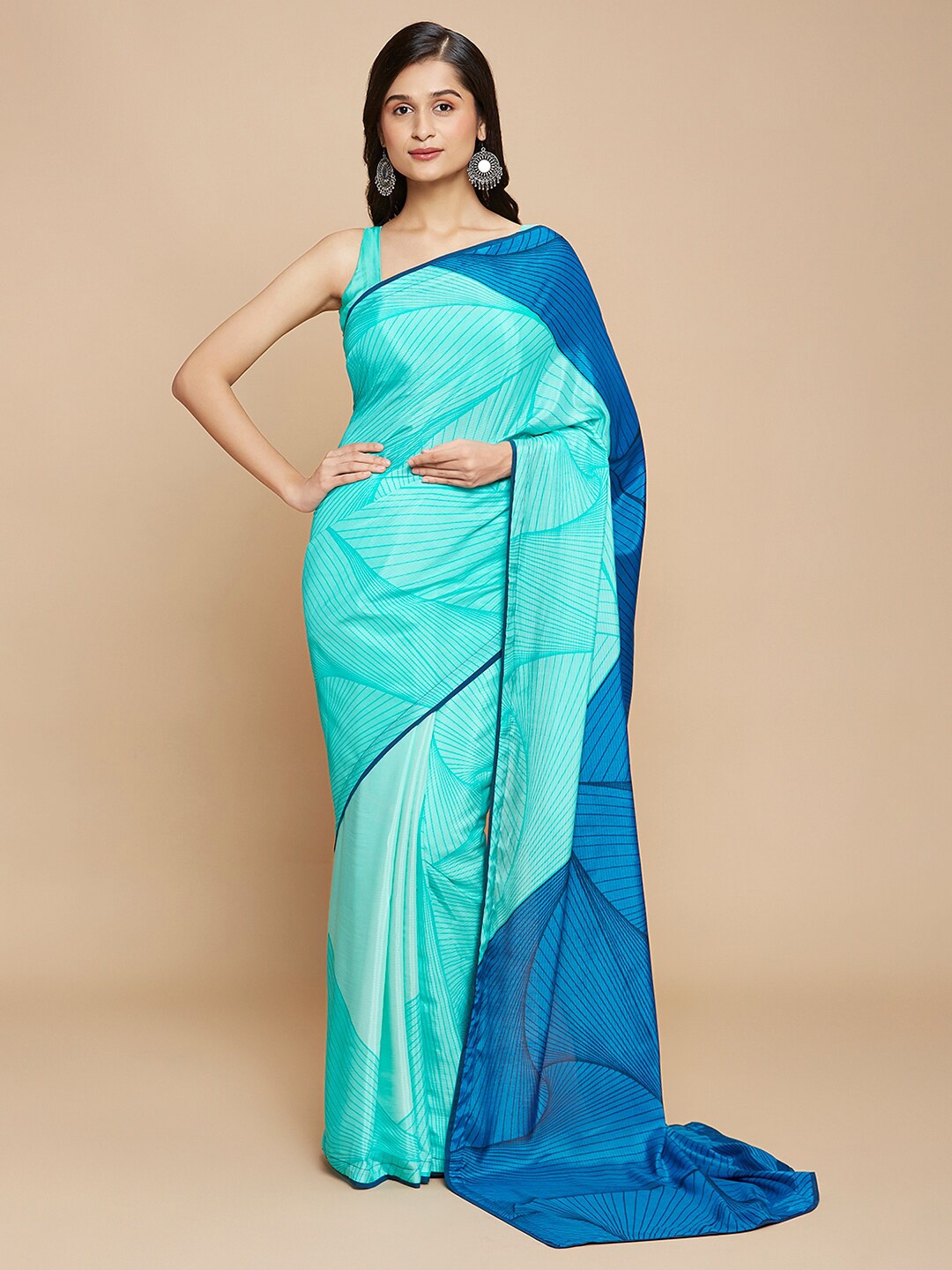 

navyasa Blue Colourblocked Saree