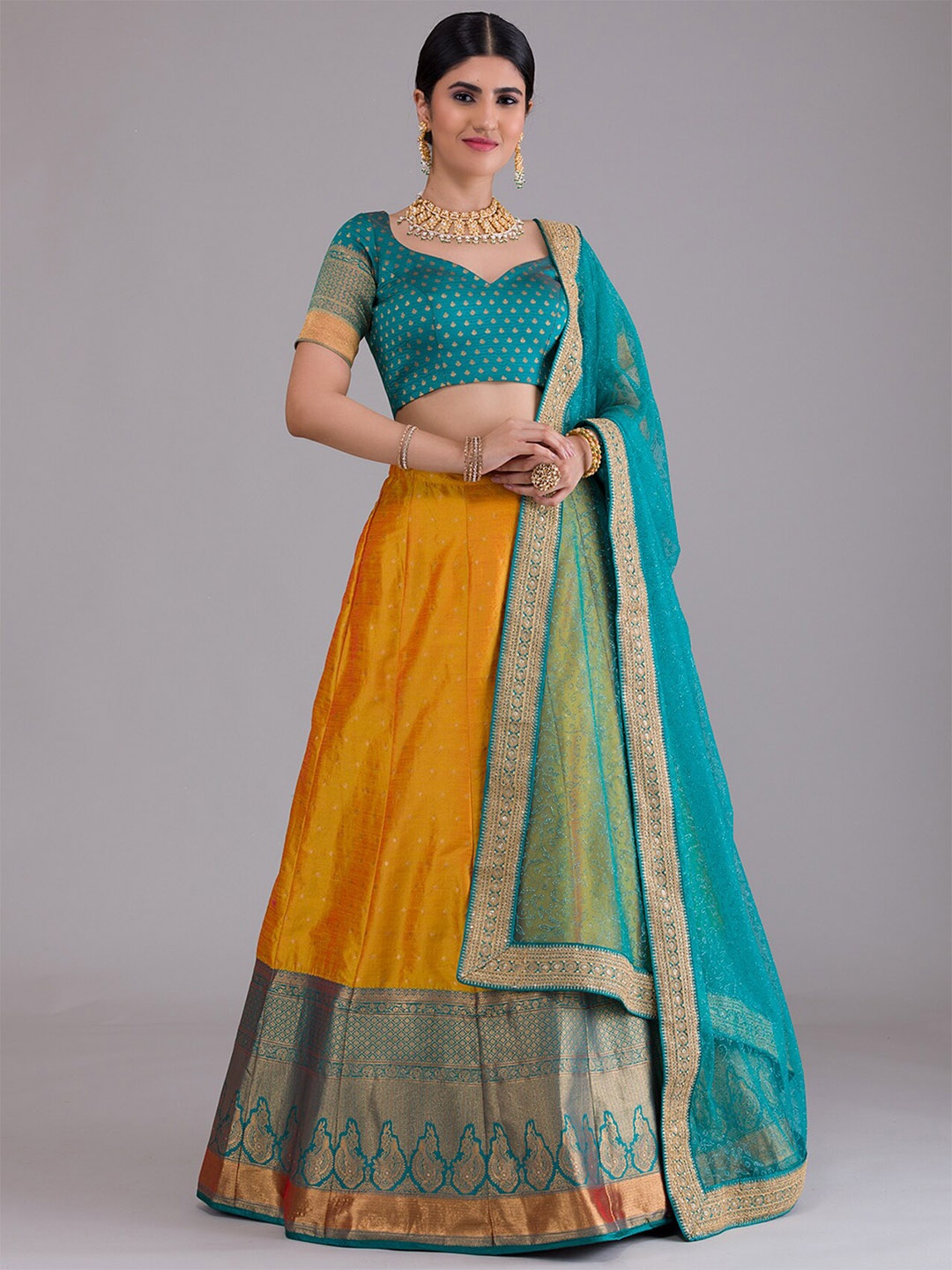 

Koskii Mustard & Blue Semi-Stitched Lehenga & Unstitched Blouse With Dupatta