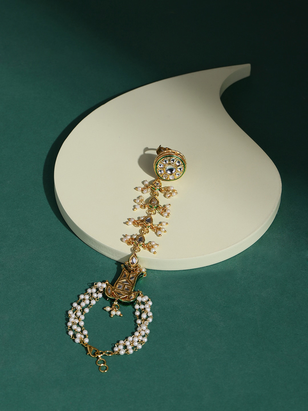 

Ruby Raang Women Gold-Toned & White Brass Kundan Gold-Plated Link Bracelet
