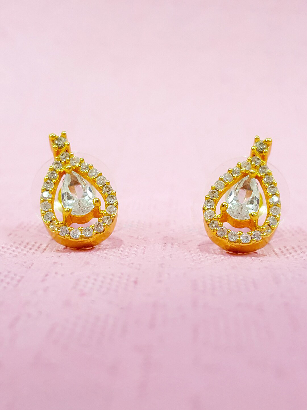 

OOMPH Gold-Toned & White Cubic Zirconia Teardrop Shaped Studs Earrings