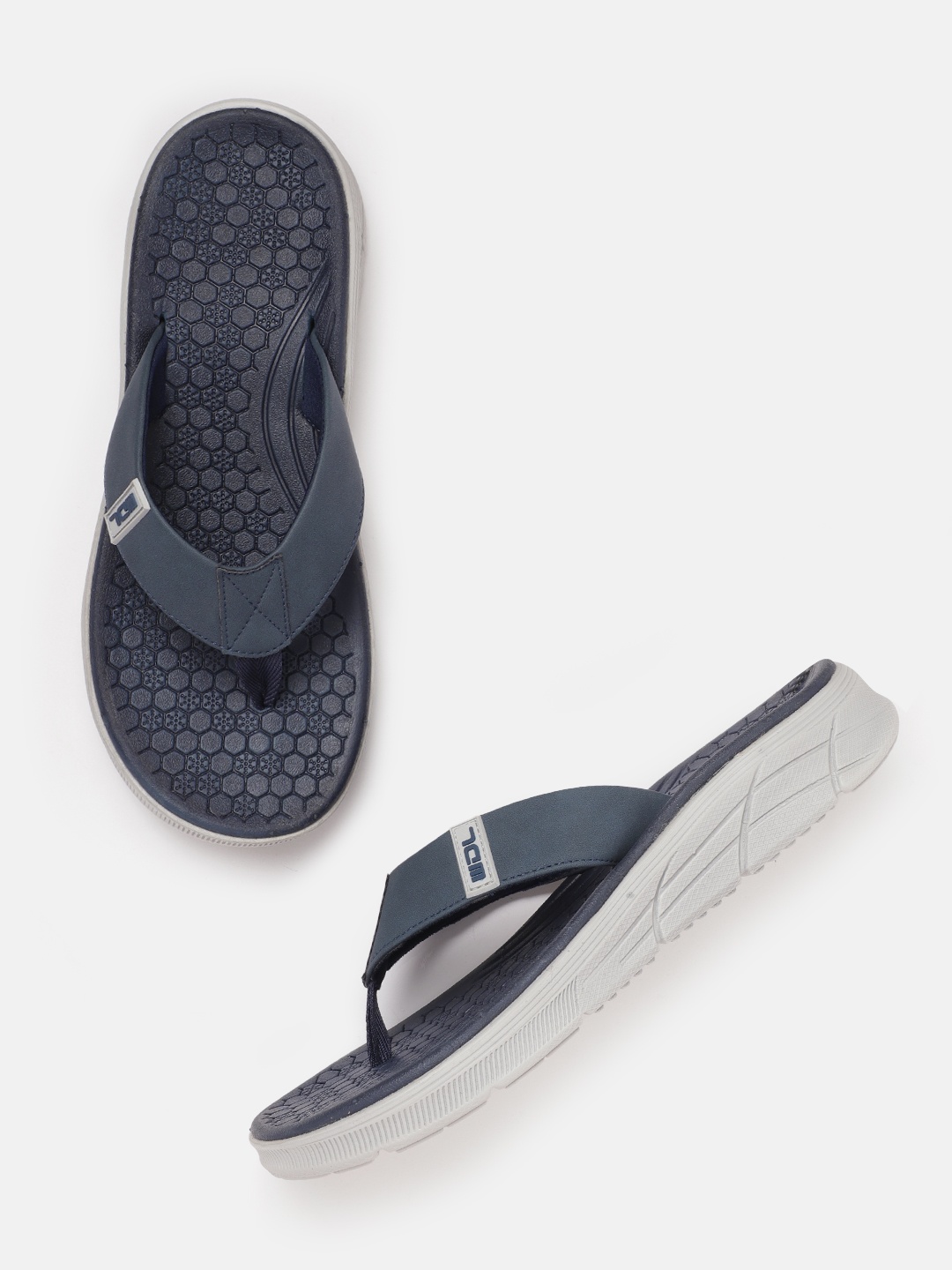 

Woodland Men Navy Blue Solid Thong Flip-Flops