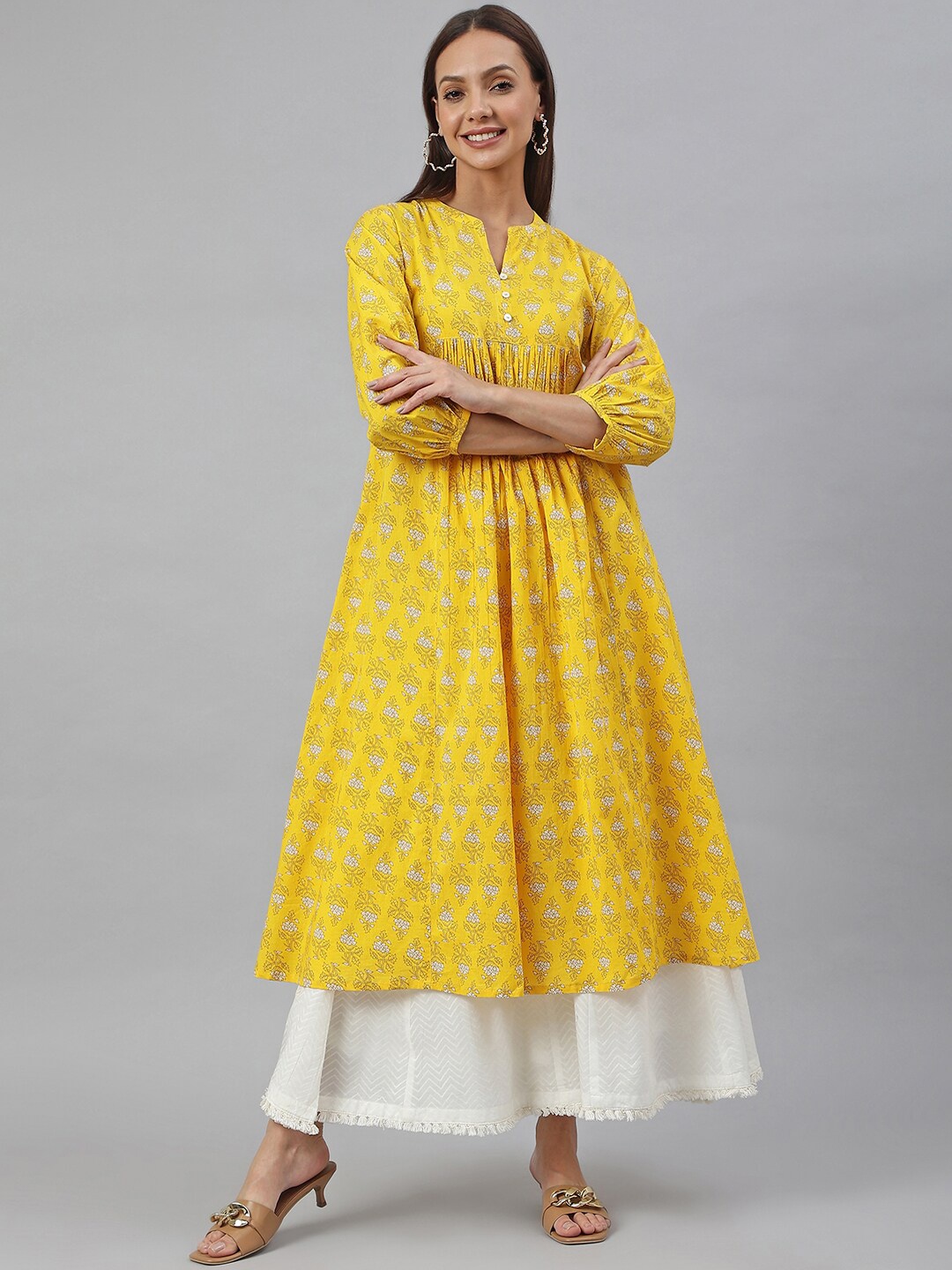

Janasya Women Yellow Ethnic Motifs Printed Anarkali Kurta