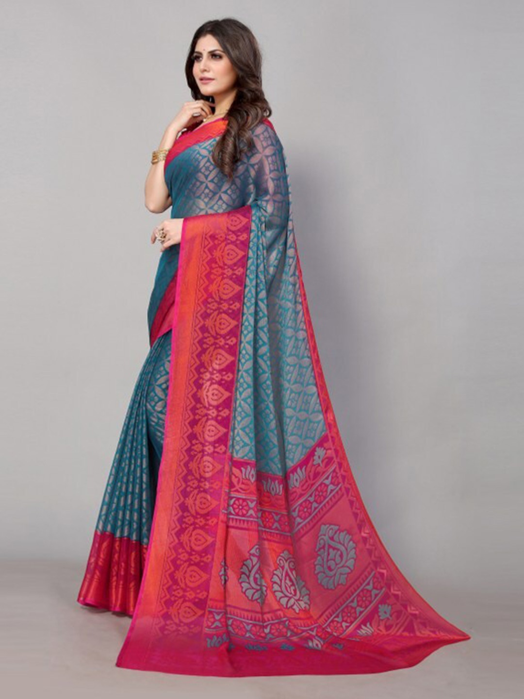 

Yashika Teal & Pink Floral Printed Saree