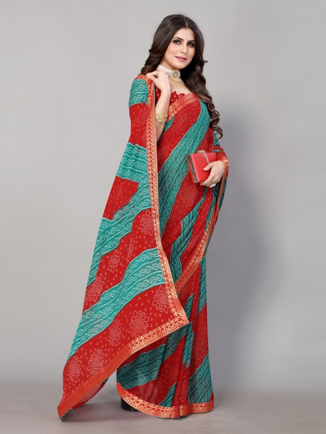 

Yashika Teal & Red Bandhani Printed Saree