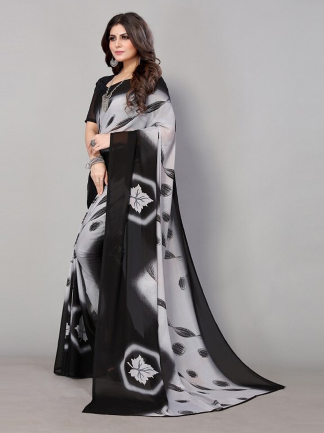 

Yashika Black & Grey Floral Printed Saree