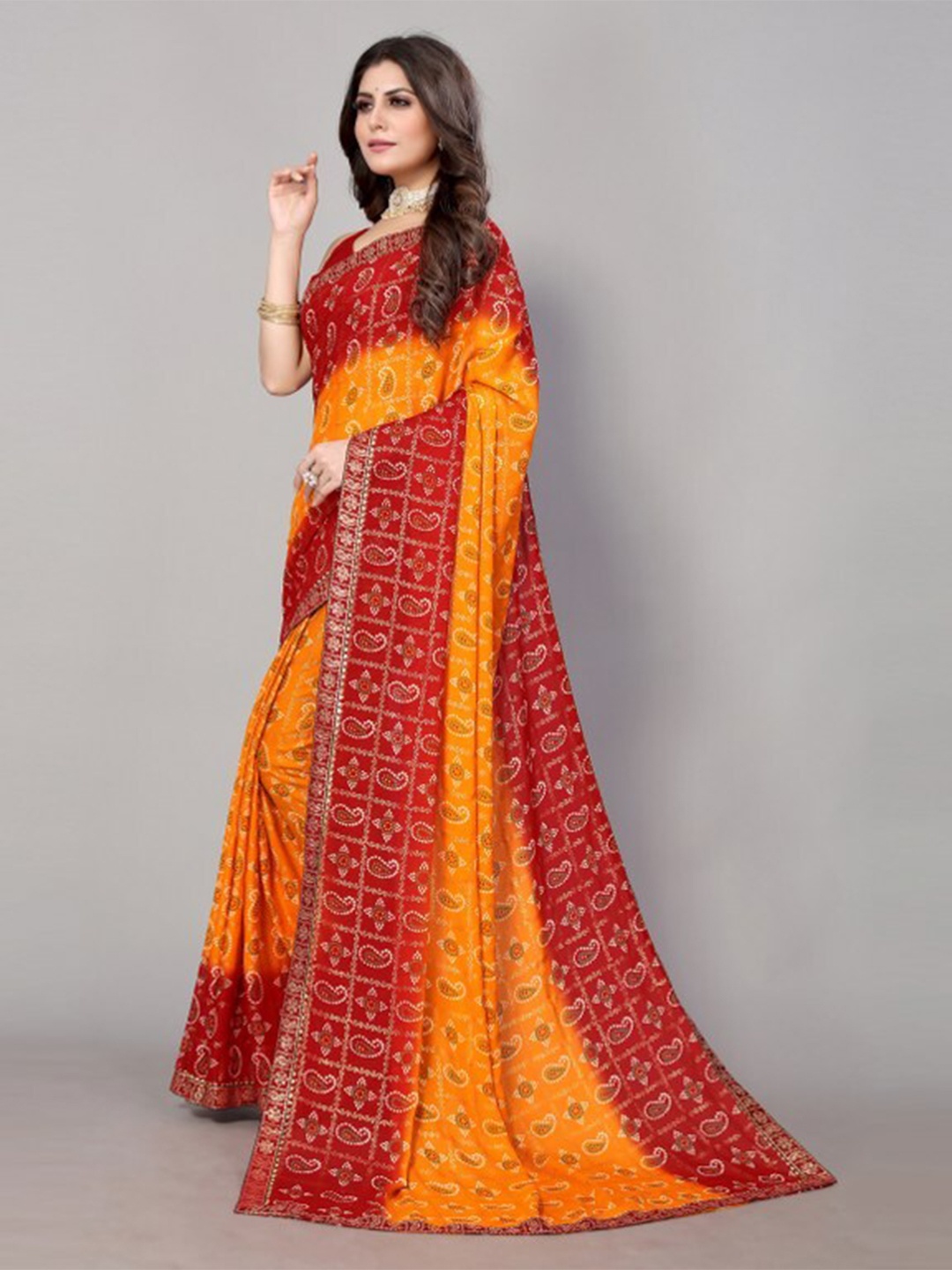 

Yashika Yellow & Red Ethnic Motifs Printed Saree