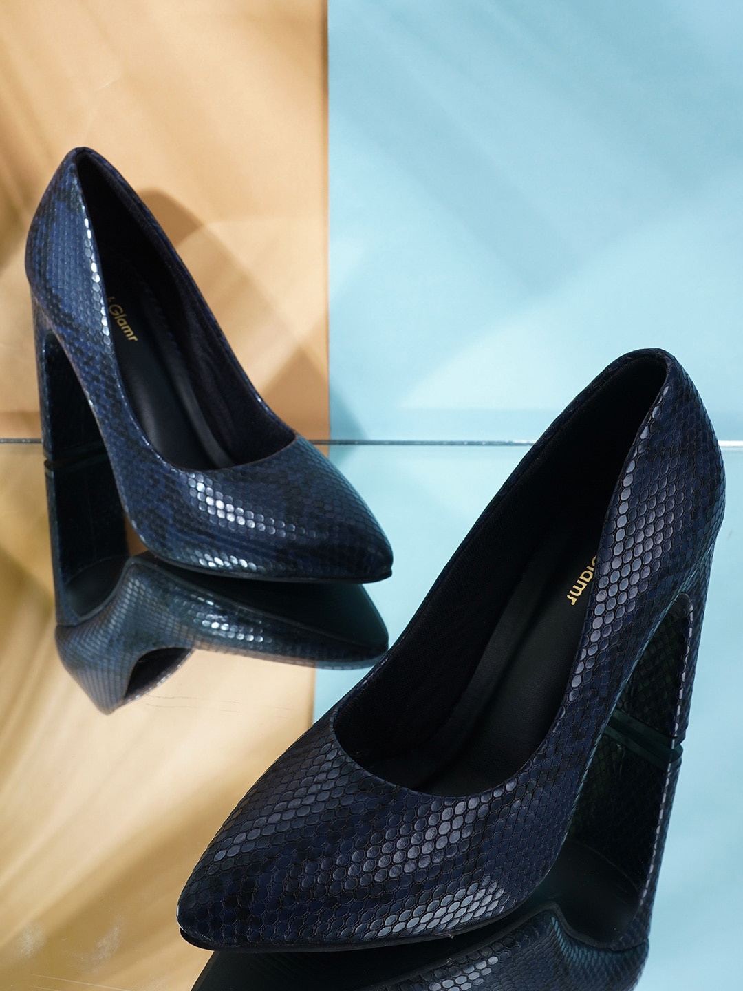 

Get Glamr Navy Blue Textured Block Pumps